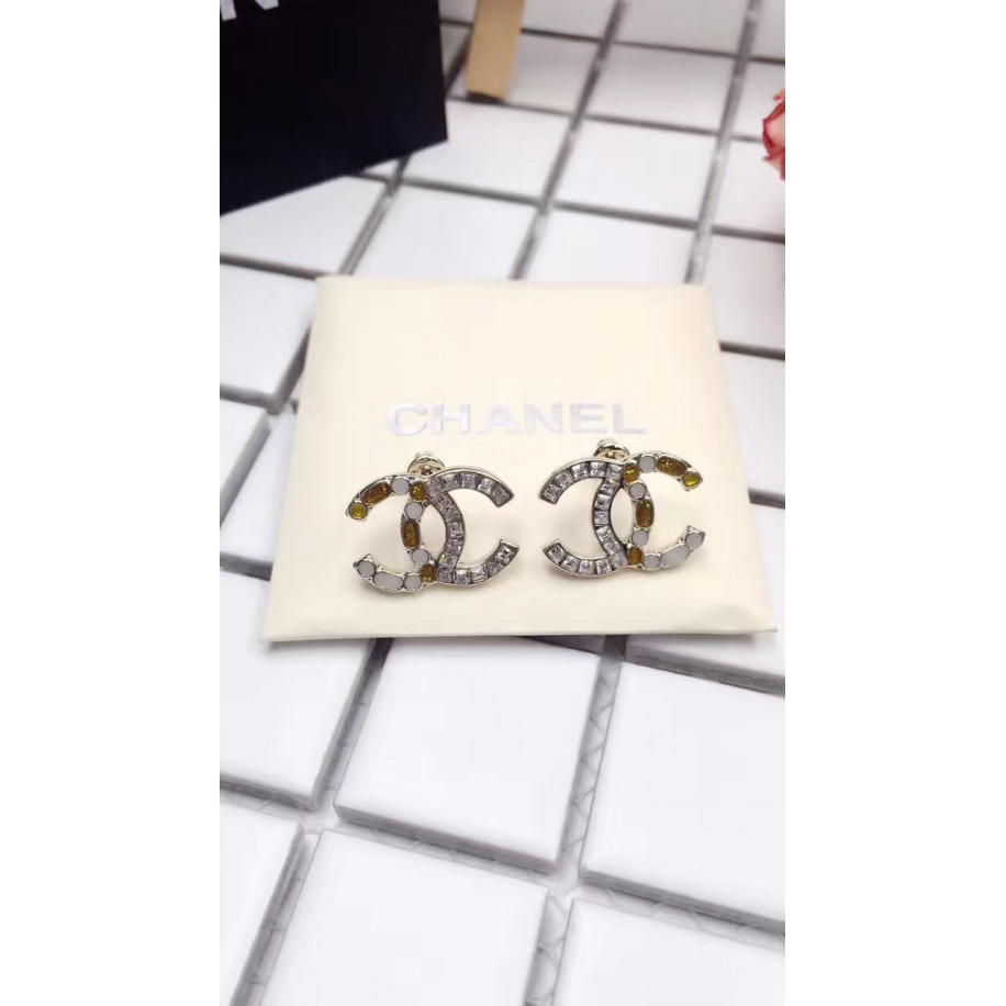 Золотые Серьги Chanel значок бело - коньячные камни