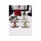 Серебристая Брошка Chanel значок серебристый кожа