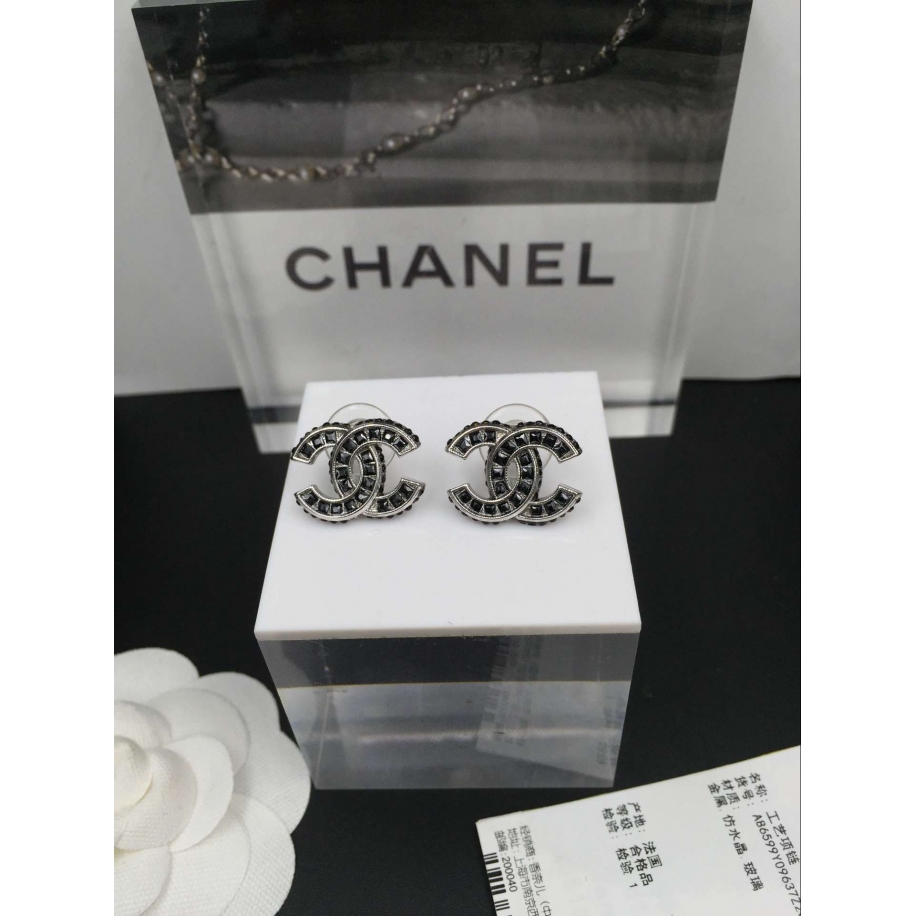 Черные серьги Chanel камни