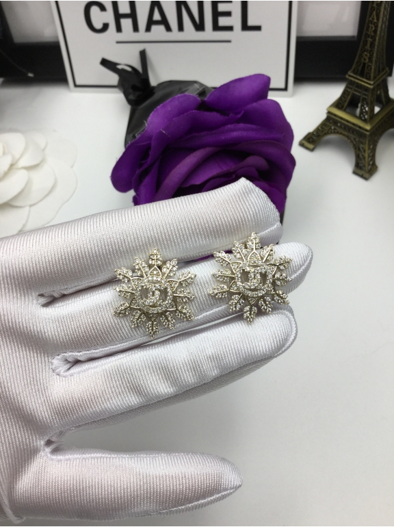 Золотые Серьги Chanel золотые снежинки камни