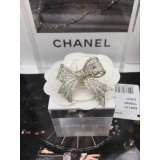 Золотая Брошка Chanel бантик золотые камни