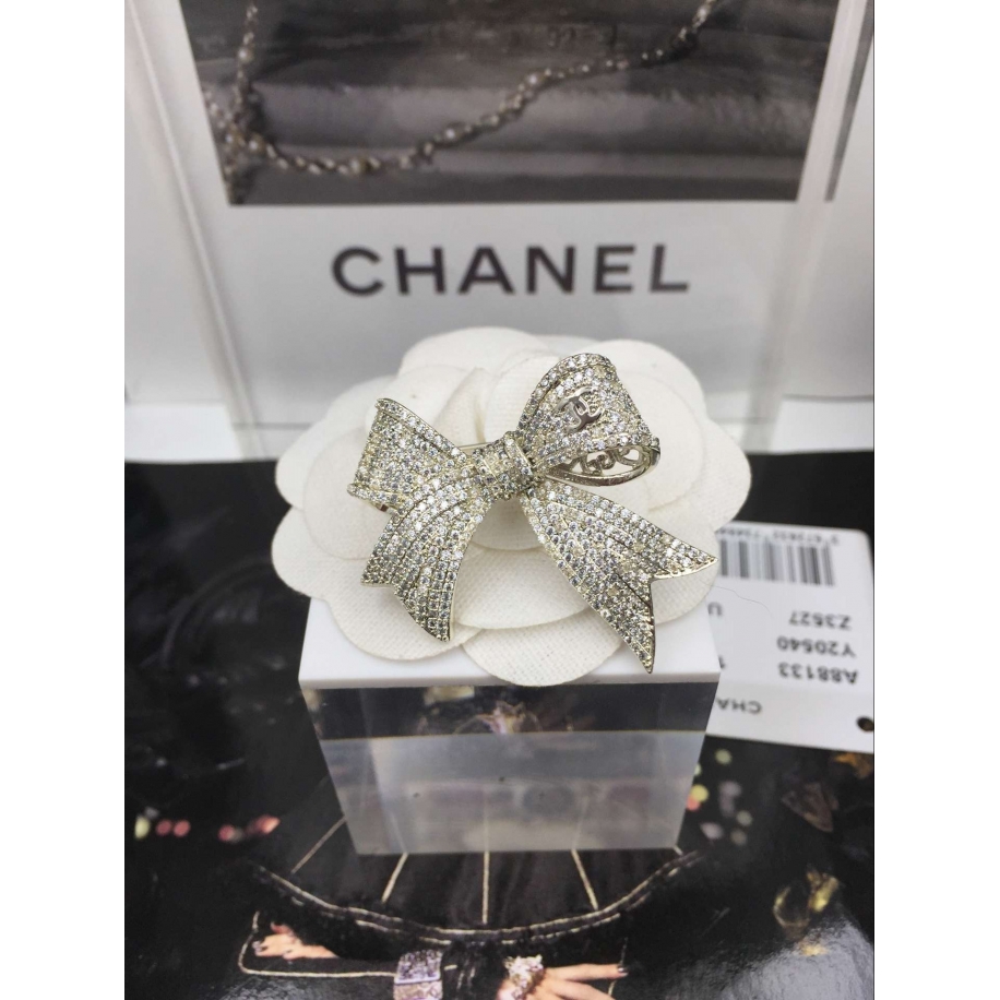 Золотая Брошка Chanel бантик золотые камни