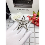 Черная брошка Chanel звезда