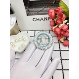 Белая брошка Chanel круг бирюзовые камни