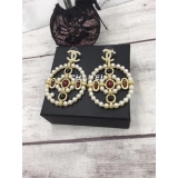 Золотые серьги Chanel значок белый овал жемчужины
