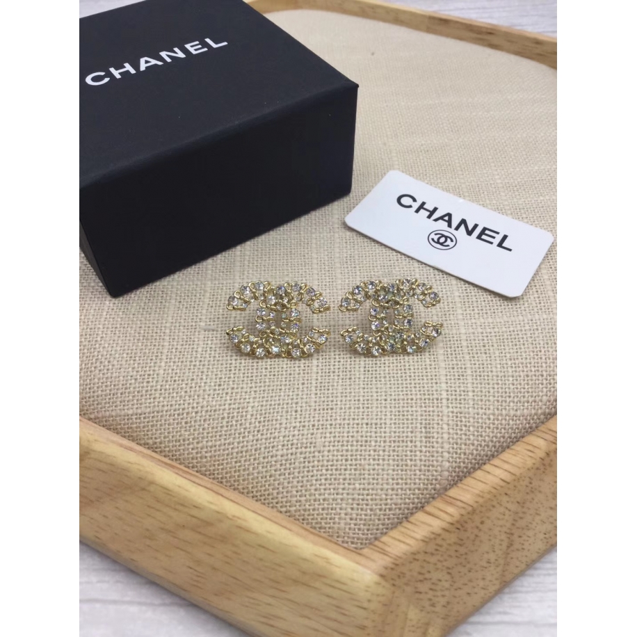 Серьги Chanel золотой значок камни 