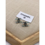 Золотые серьги Chanel значок голубые камни 