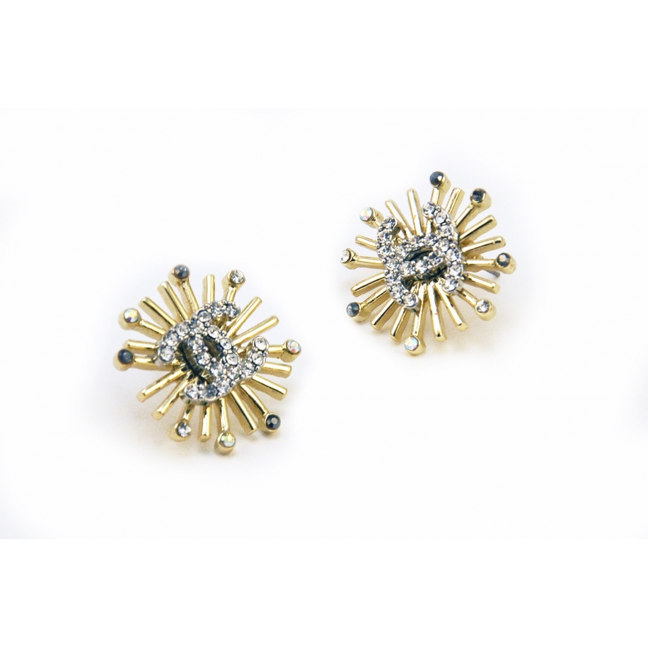 Золотые серьги Chanel звезды камни
