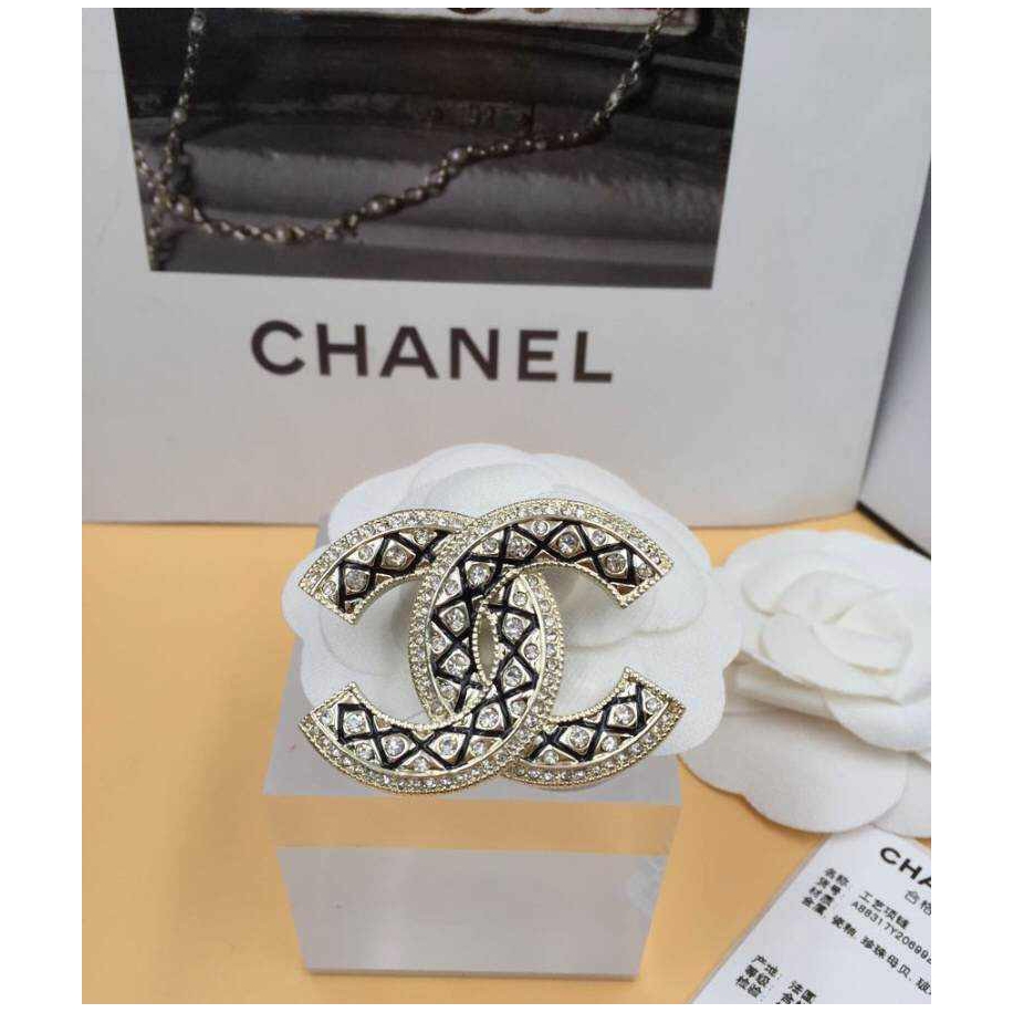 Золотая брошка Chanel эмаль камни